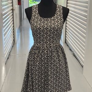 Chic Black and White Mini Dress with Flared Hem